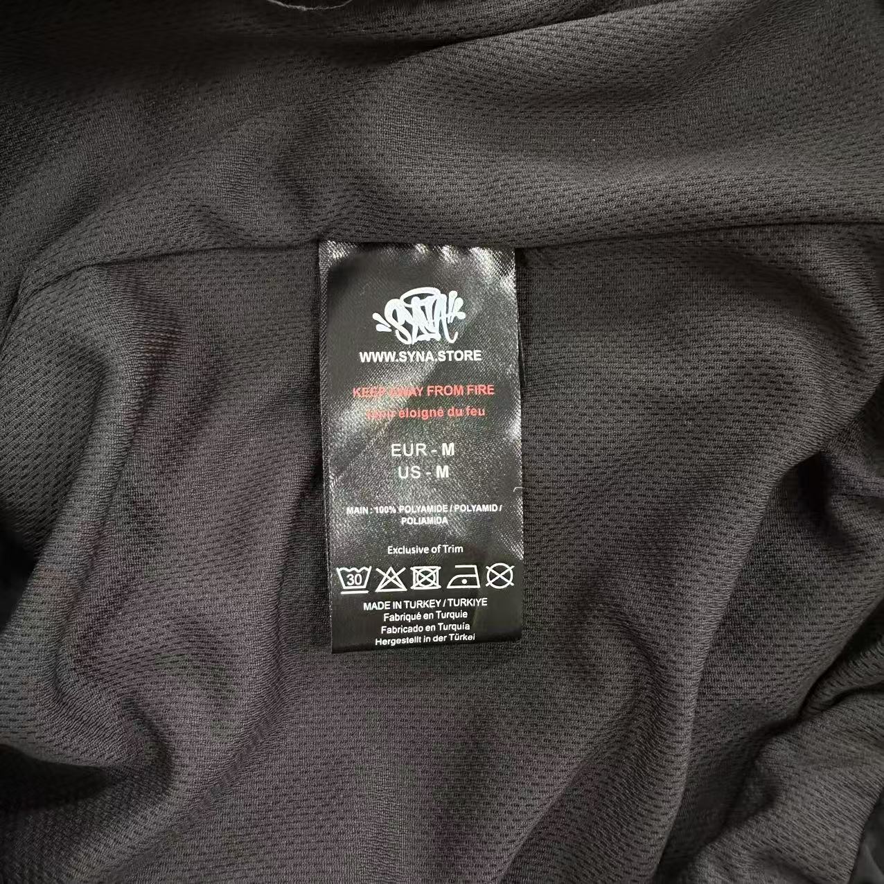 Conjuto Syna World Shell-Tracksuit-Black/Orange